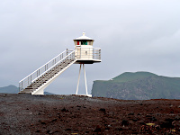 Urdaviti Lighthouse (East Coast) with Bjarnarey Island